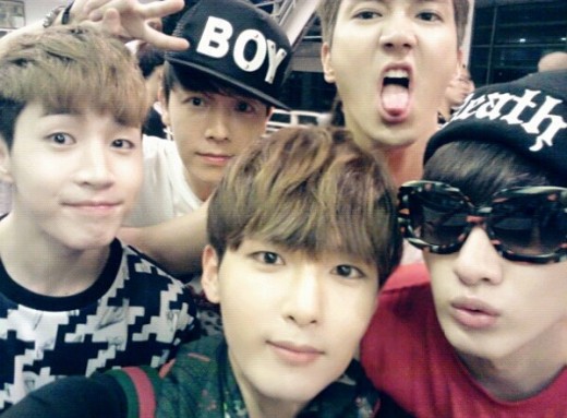 Super Junior-M take a group shot before fan meeting in Thailand