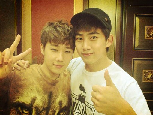 Taecyeon and Sunggyu share a friendly snapshot backstage at &lsquo;Music Bank In Jakarta&rsquo;