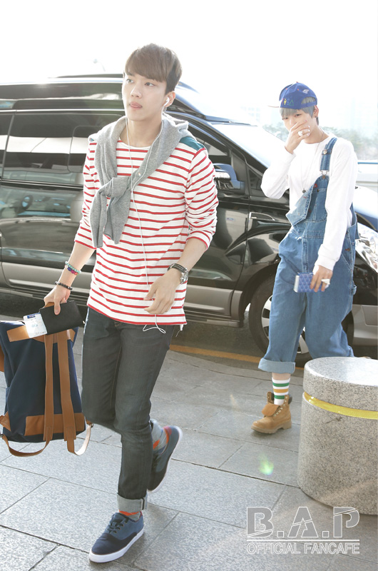 B.A.P show off their chic airport fashion en route to China